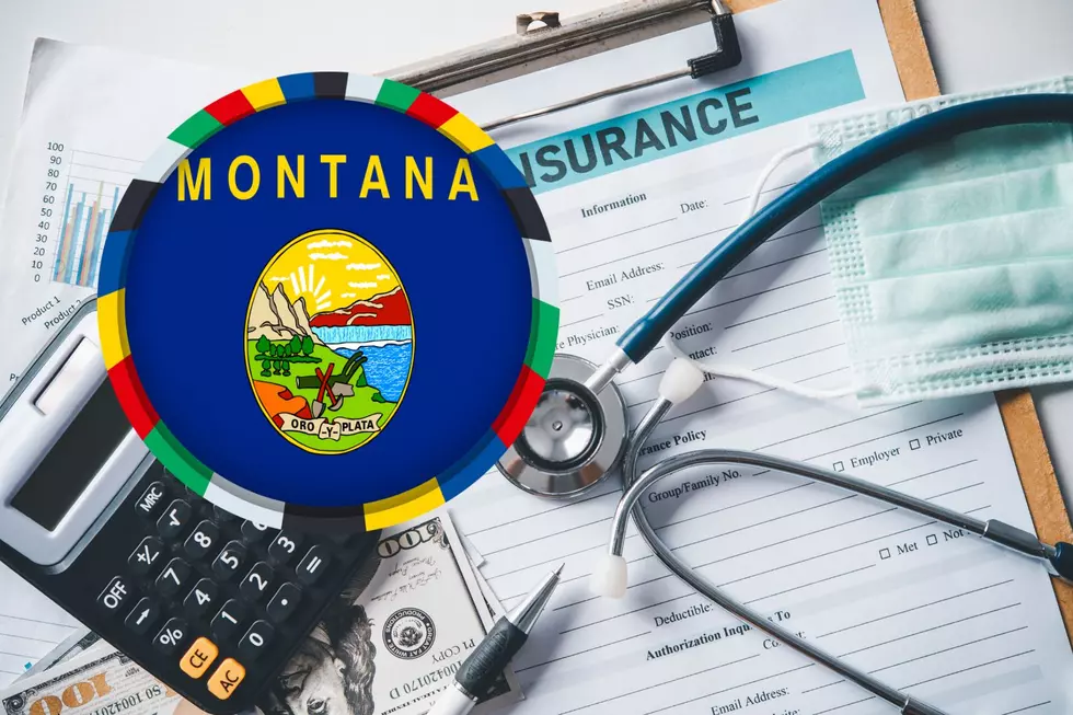 Montana state seal over health insurance forms with a stethoscope, mask, and calculator on a desk.